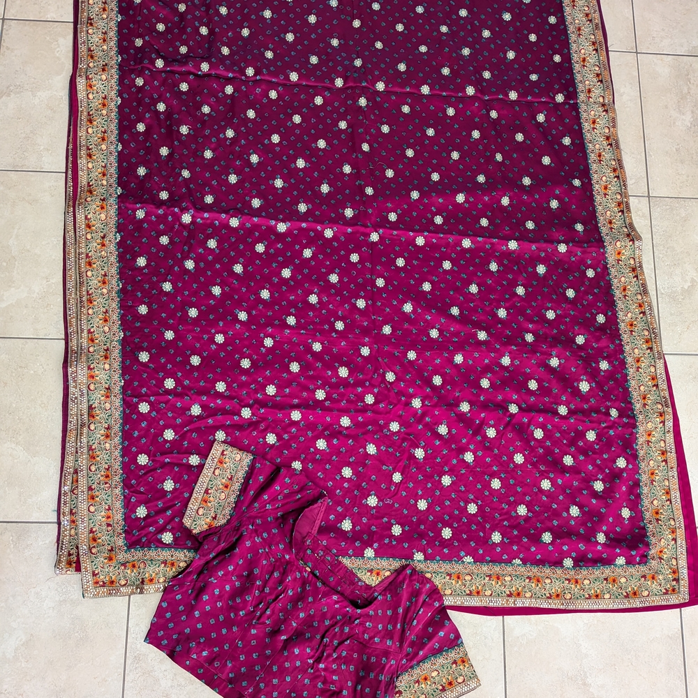 Vibrant Magenta Saree with Intricate Border